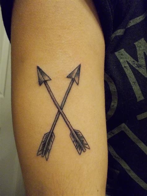 arrows meaning tattoo|what do crossed arrows symbolize.